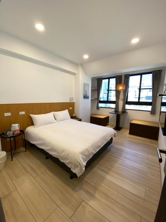 良文旅 Ryou Hotel Тайнань Экстерьер фото