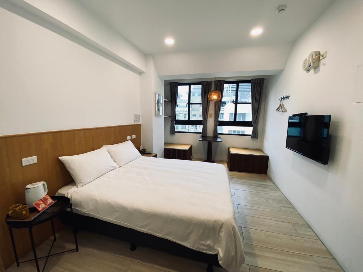 良文旅 Ryou Hotel Тайнань Экстерьер фото