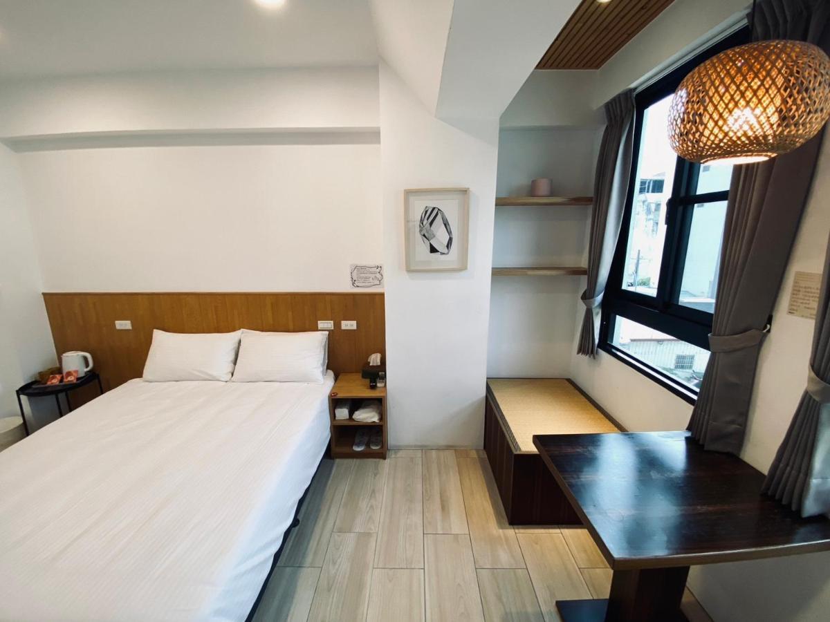 良文旅 Ryou Hotel Тайнань Экстерьер фото