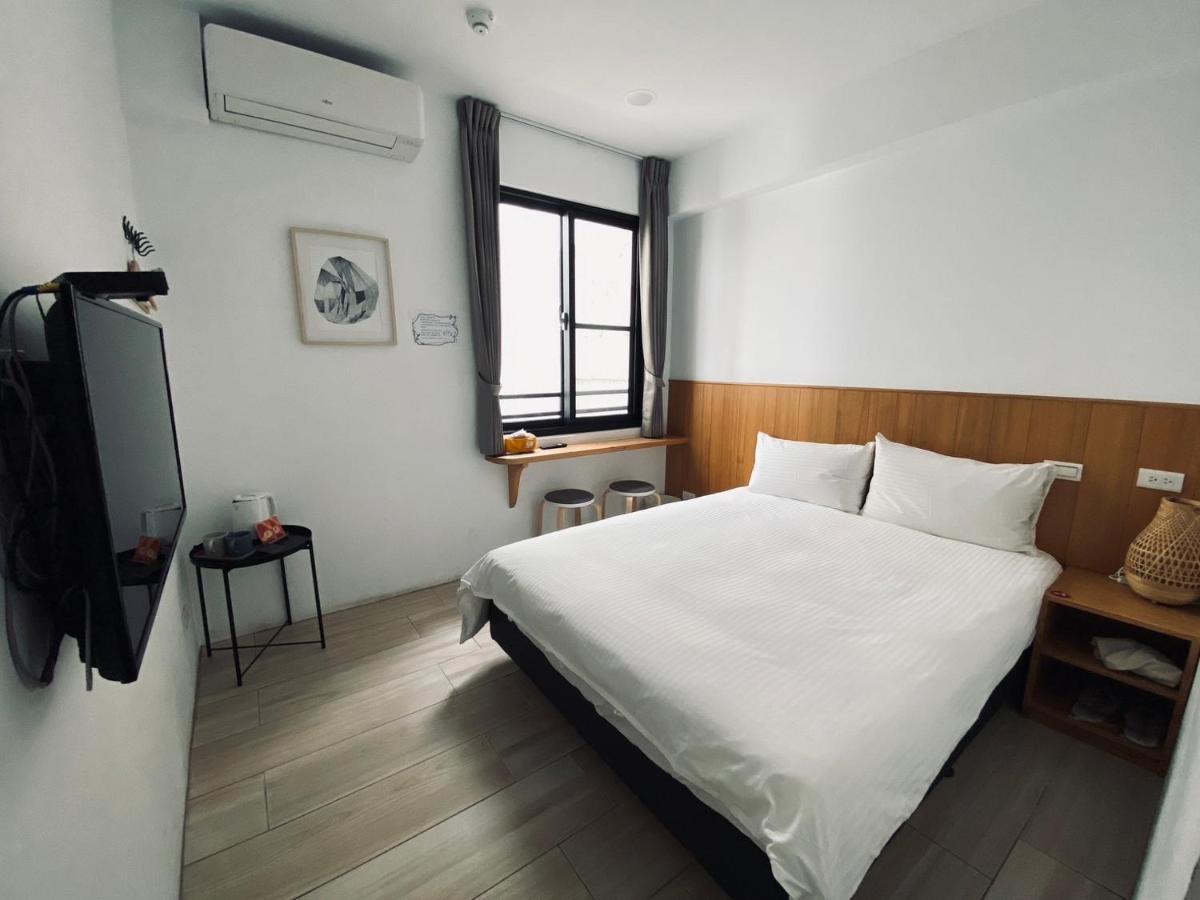 良文旅 Ryou Hotel Тайнань Экстерьер фото
