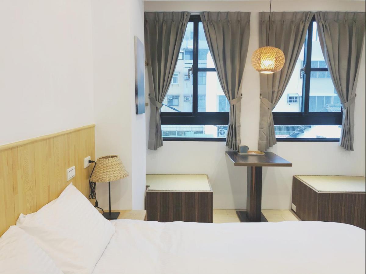 良文旅 Ryou Hotel Тайнань Экстерьер фото